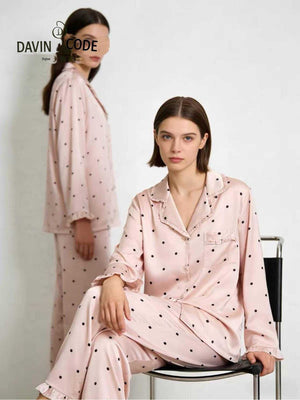 Close view of the button front and collar on the letter print pajama set
