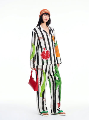 Black and white stripe pajama set with patch pockets and painted fruit details