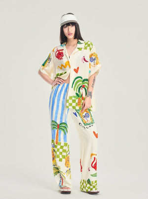 Detail of the multicolor graffiti print on the pajama set shirt