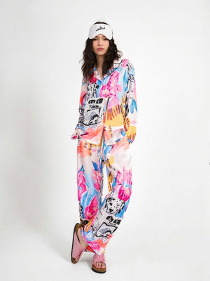 Close view of the dalmatian, flower and tiger print on the pink loungewear set