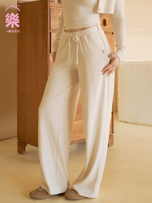 Vanilla White wide leg sweatpants shown from the side