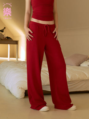 Close view of Fireworks Red sweatpants showing the drawstring waist