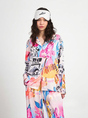 Women's two-piece pajama set in pink print with notched collar long sleeve shirt