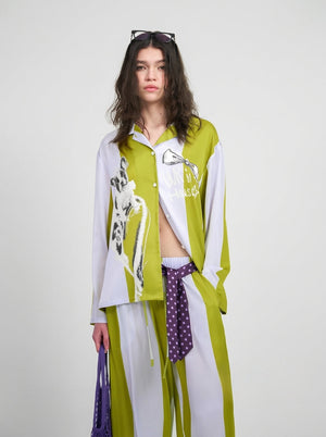 Striped pajama set shirt with sketch print and button front, close view