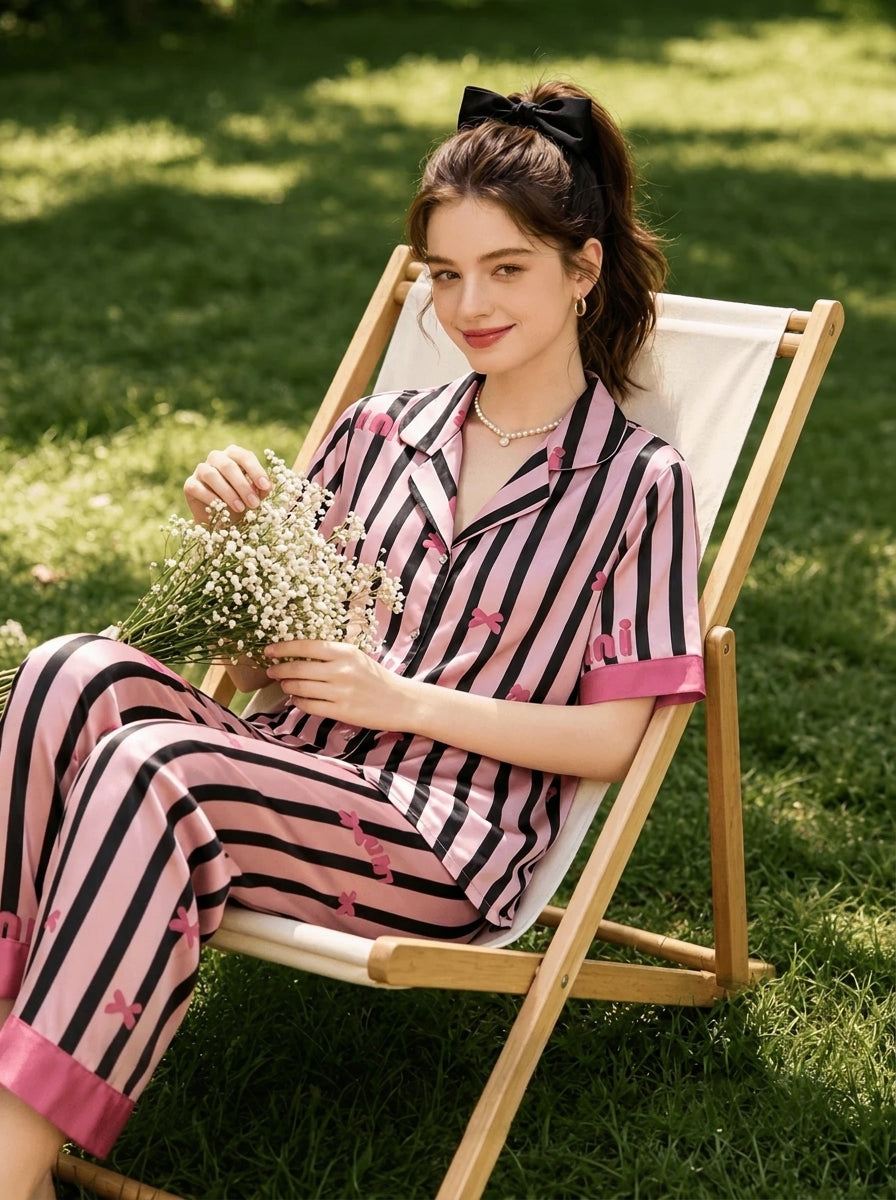 Womens pajama set in pink, black and white stripes with a notched collar