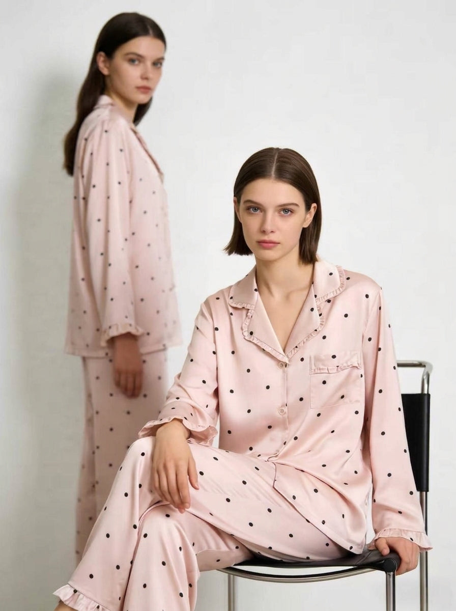 Close view of the button front and collar on the letter print pajama set