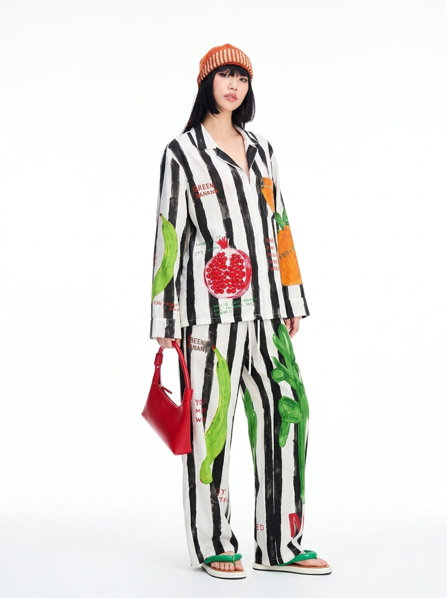Black and white stripe pajama set with patch pockets and painted fruit details