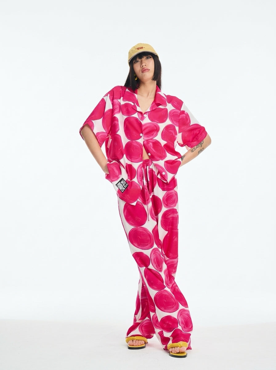 Pink polka dot loungewear set with matching top and pants
