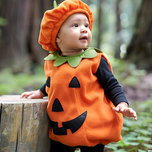 Baby pumpkin costume in orange fleece with black jack-o'-lantern face and green leaf collar, perfect Halloween kids costumes for toddlers