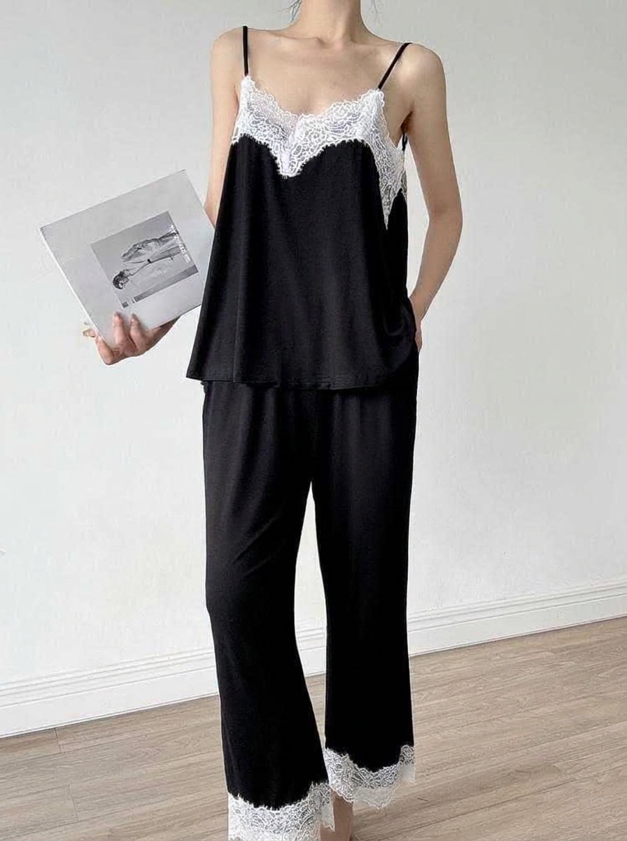 Gray camisole and cropped pants pajama set with white lace trim