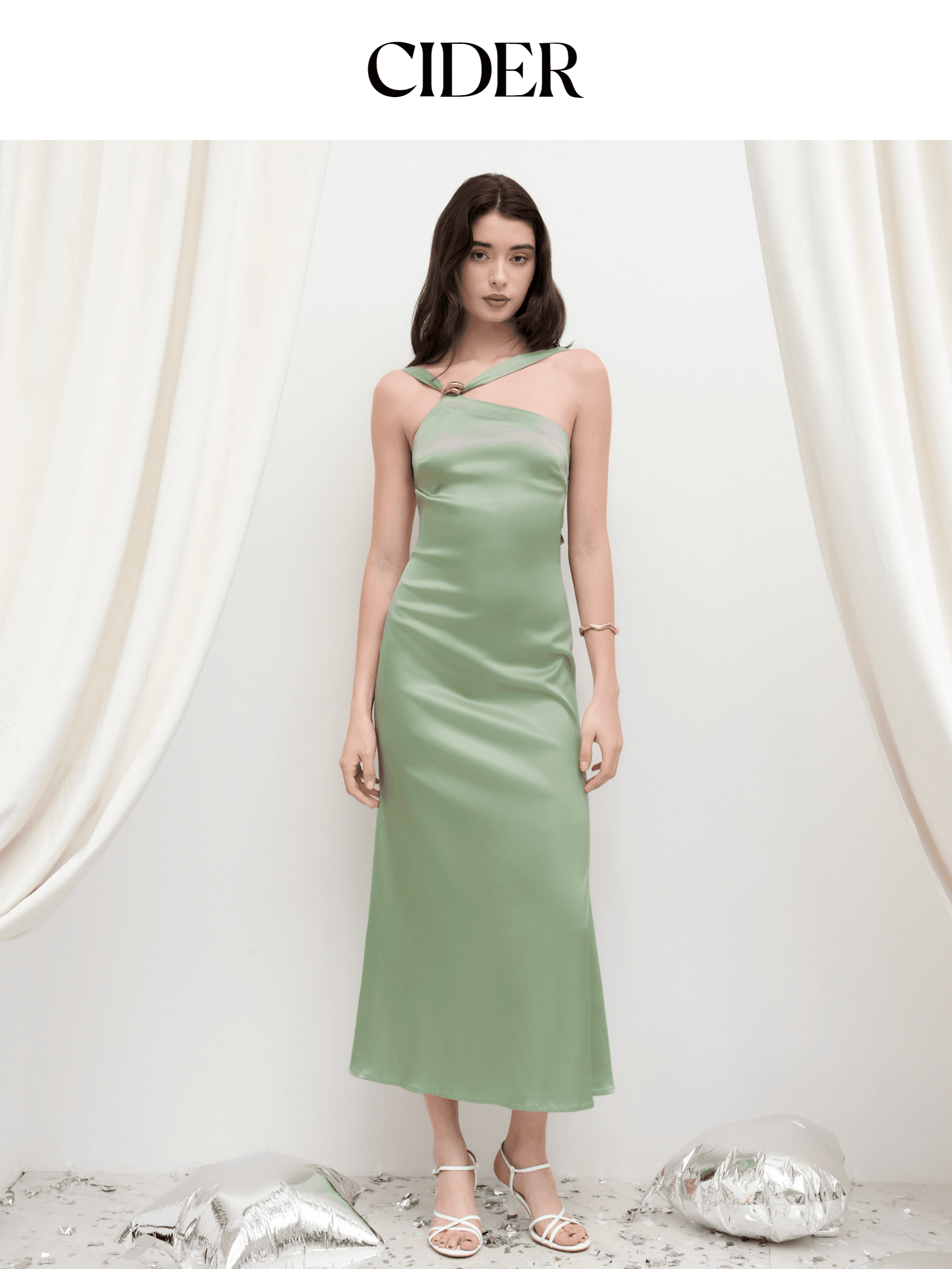 فستان سايدر ستان طويل CIDER One-Shoulder Satin Maxi Dress | فستان سهرة ماكسي بحلقة معدنية على الكتف وقصة تنحت الخصر