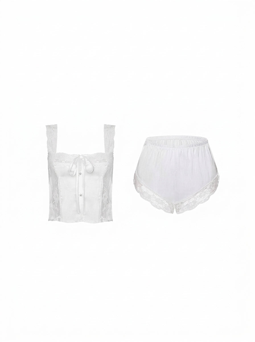 Lace-trimmed two-piece pajama set worn on a model