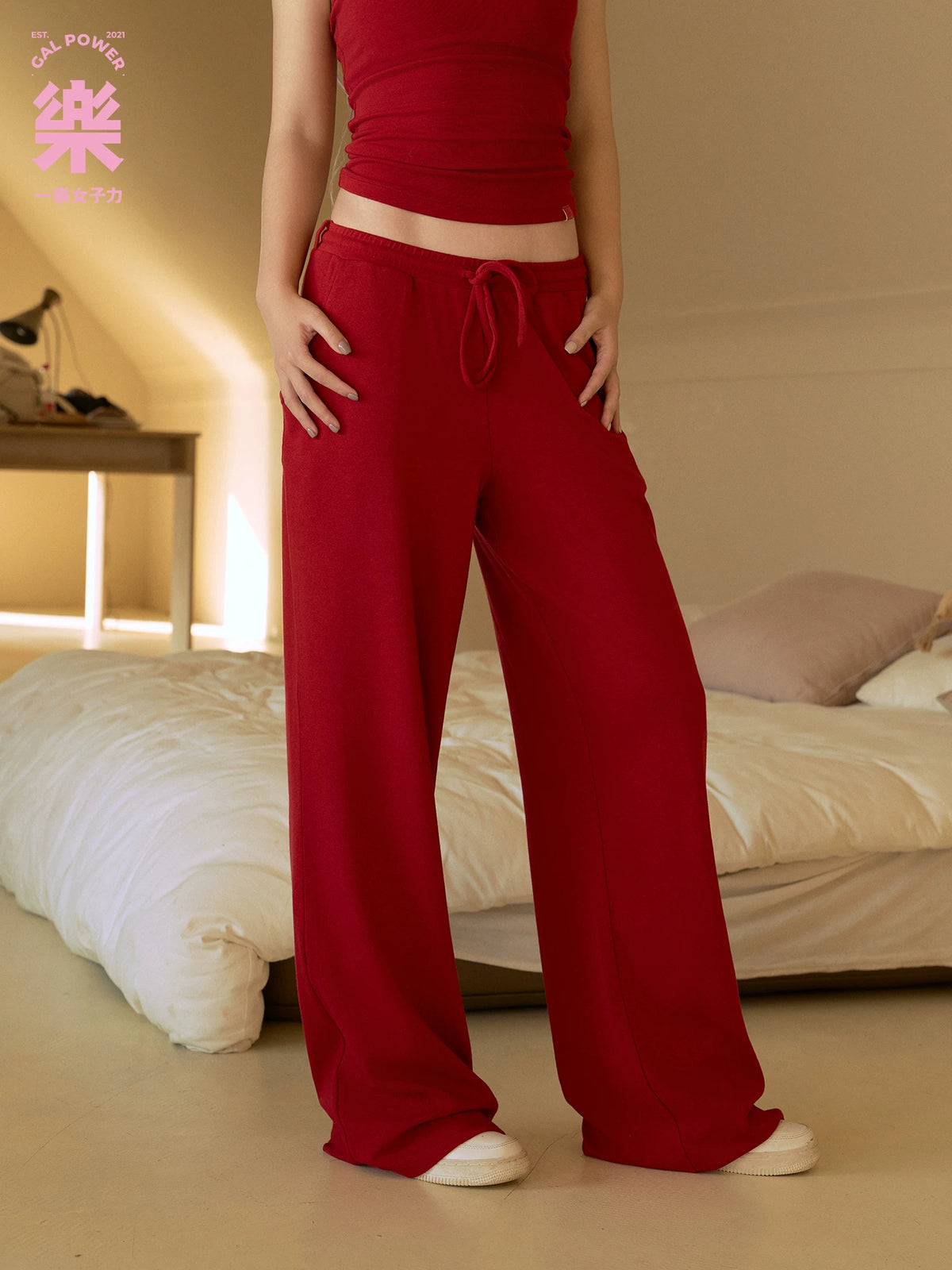 Close view of Fireworks Red sweatpants showing the drawstring waist
