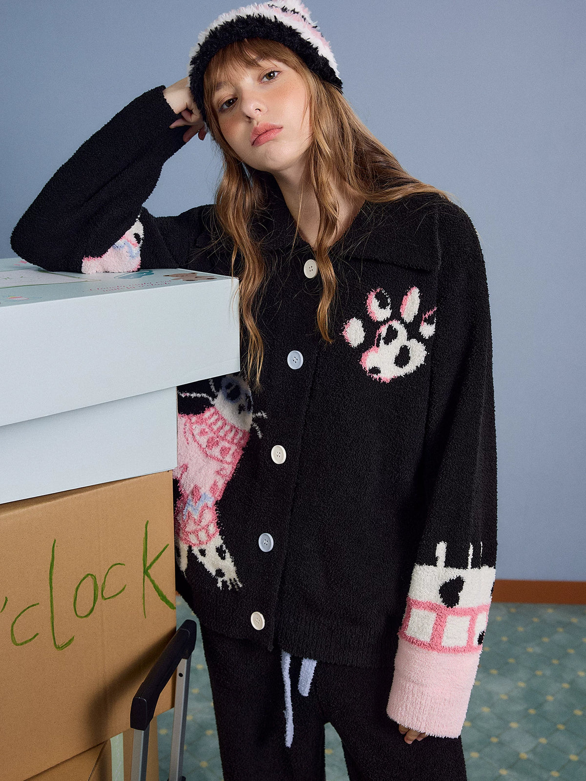 Coral fleece loungewear set in black, upper body angled view